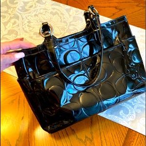 Coach black patent leather purse.